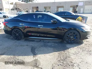 2017 Nissan Maxima SV with VIN 1N4AA6AP4HC397602, listed as a IAAI auction lot 41954840 with 111,076 mi miles and . Bid and sale history available at DreamBid. Image 13.