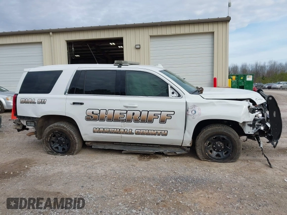 2020 Chevrolet Tahoe Commercial with VIN 1GNLCDEC7LR199179, listed as a IAAI auction lot 41502623 with 87,271 mi miles and . Bid and sale history available at DreamBid. Image 13.