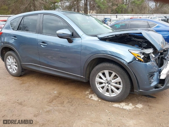 2016 Mazda CX-5 Touring with VIN JM3KE2CY0G0863387, listed as a IAAI auction lot 41612475 with NaN miles. Bid and sale history available at carsss.com. Image 1.