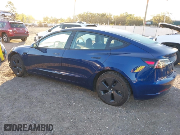 2022 Tesla Model 3 with VIN 5YJ3E1EA3NF190553, listed as a IAAI auction lot 41760731 with 90,268 mi miles. Bid and sale history available at carsss.com. Image 3.