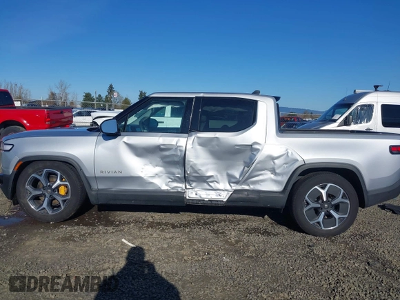 2023 Rivian R1T Adventure with VIN 7FCTGAAA0PN021864, listed as a IAAI auction lot 41620630 with 1 mi miles. Bid and sale history available at carsss.com. Image 14.