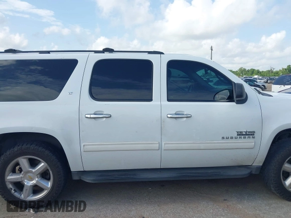 2011 Chevrolet Suburban LT with VIN 1GNSCJE09BR150452, listed as a IAAI auction lot 42655961 with 208,311 mi miles and . Bid and sale history available at DreamBid. Image 13.