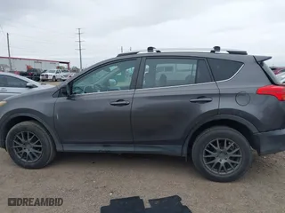2014 Toyota RAV4 LE with VIN 2T3ZFREVXEW081655, listed as a IAAI auction lot 41583283 with 141,228 mi miles. Bid and sale history available at carsss.com. Image 14.