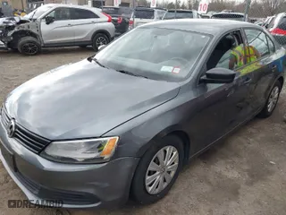 2014 Volkswagen Jetta Sedan S with VIN 3VW2K7AJ6EM294010, listed as a IAAI auction lot 42042840 with 89,774 mi miles. Bid and sale history available at carsss.com. Image 6.