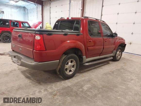 2003 Ford Explorer Sport Trac XLS z VIN 1FMZU67EX3UC27706, wystawiony jako IAAI lot #42214344 z przebiegiem 181 537 mil mil oraz . Historia ofert i sprzedaży dostępna na DreamBid. Obrazek 4.