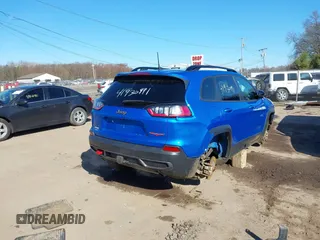 2022 Jeep Cherokee Trailhawk z VIN 1C4PJMBX5ND553336, wystawiony jako IAAI lot #41930991 z przebiegiem 40 832 mil mil oraz . Historia ofert i sprzedaży dostępna na DreamBid. Obrazek 4.