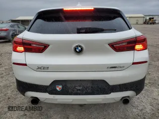 2019 BMW X2 sDrive28i with VIN WBXYJ3C58K5N39693, listed as a Copart auction lot 86760414 with 77,668 mi miles and Salvage Title. Bid and sale history available at carsss.com. Image 6.