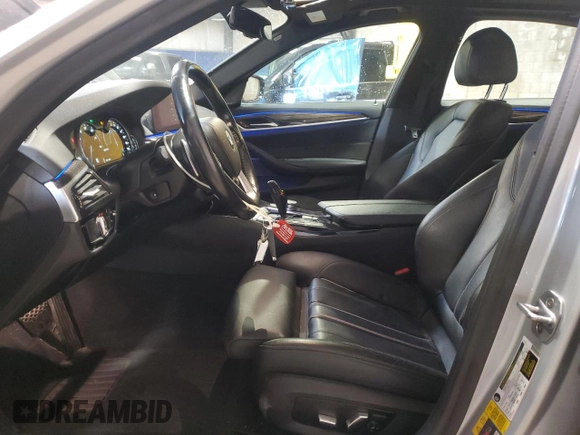 2019 BMW 5 Series 530e xDrive with VIN WBAJB1C56KB376153, listed as a Copart auction lot 58242585 with 67,638 mi miles and Salvage title. Bid and sale history available at DreamBid. Image 7.
