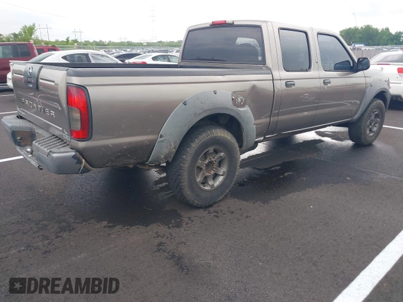 2003 Nissan Frontier XE z VIN 1N6ED29X93C444600, wystawiony jako IAAI lot #42097322 z przebiegiem 317 599 mil mil oraz . Historia ofert i sprzedaży dostępna na DreamBid. Obrazek 4.