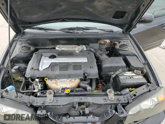 2004 Hyundai Elantra GLS z VIN KMHDN46D14U812275, wystawiony jako Copart lot #54163945 z przebiegiem 209 400 mil mil oraz Szkoda całkowita • Salvage title. Historia ofert i sprzedaży dostępna na DreamBid. Obrazek 11.