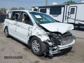 2007 Honda Odyssey EX-L with VIN 5FNRL38617B141003, listed as a IAAI auction lot 39232543 with 195,096 mi miles and . Bid and sale history available at DreamBid. Image 1.