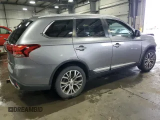 2017 Mitsubishi Outlander SE z VIN JA4AZ3A35HZ020153, wystawiony jako Copart lot #57235705 z przebiegiem 77 229 mil mil oraz Szkoda całkowita • Salvage title. Historia ofert i sprzedaży dostępna na DreamBid. Obrazek 3.