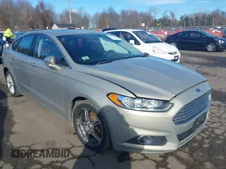 2015 Ford Fusion SE Hybrid with VIN 3FA6P0LUXFR133979, listed as a IAAI auction lot 41831288 with 143,738 mi miles. Bid and sale history available at carsss.com. Image 1.