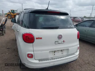2014 FIAT 500L Lounge z VIN ZFBCFACH4EZ029431, wystawiony jako IAAI lot #42110055 z przebiegiem 103 789 mil mil oraz . Historia ofert i sprzedaży dostępna na DreamBid. Obrazek 3.