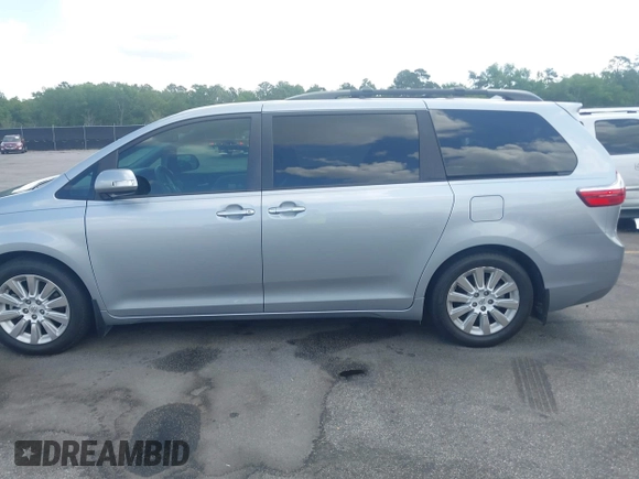 2015 Toyota Sienna XLE with VIN 5TDYK3DC5FS685735, listed as a IAAI auction lot 42139229 with 87,694 mi miles and . Bid and sale history available at DreamBid. Image 14.