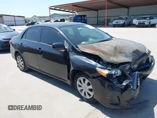 2011 Toyota Corolla L with VIN JTDBU4EE9BJ096586, listed as a IAAI auction lot 41992120 with 201,297 mi miles. Bid and sale history available at carsss.com. Image 1.