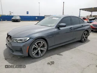 2022 BMW 3 Series 330i with VIN WBA5R1C01NFM02396, listed as a Copart auction lot 59181925 with 58,582 mi miles and Salvage title. Bid and sale history available at DreamBid. Image 1.