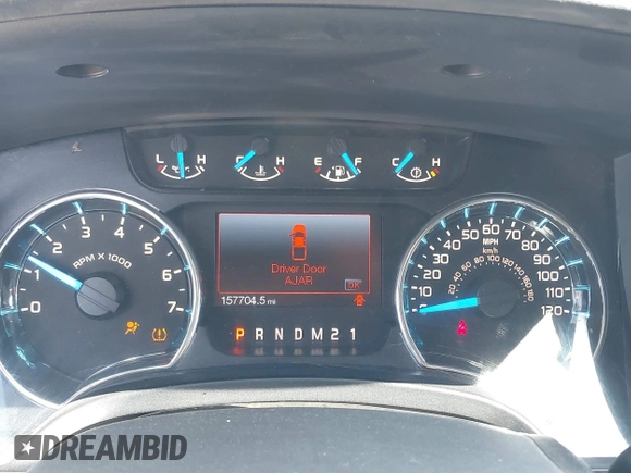 2014 Ford F-150 XL with VIN 1FTEX1CM2EFB01776, listed as a IAAI auction lot 41806274 with 157,704 mi miles. Bid and sale history available at carsss.com. Image 7.