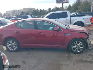 2011 Kia Optima EX with VIN KNAGN4A74B5057825, listed as a IAAI auction lot 41423999 with 1 mi miles. Bid and sale history available at carsss.com. Image 12.