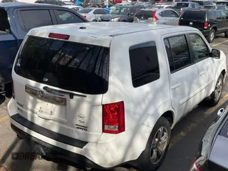 2015 Honda Pilot SE with VIN 5FNYF4H39FB028011, listed as a IAAI auction lot 42160830 with 202,846 mi miles and . Bid and sale history available at DreamBid. Image 4.