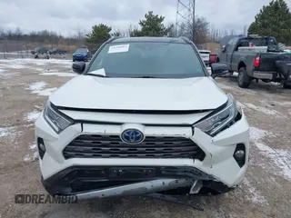 2021 Toyota RAV4 Hybrid XSE with VIN 4T3E6RFVXMU032368, listed as a IAAI auction lot 41358963 with 69,337 mi miles and . Bid and sale history available at DreamBid. Image 12.
