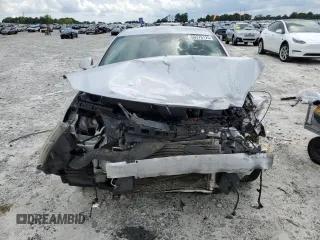 2013 Buick Regal Premium 1 с VIN 2G4GS5ER6D9220599, выставлен на аукционе Copart как лот 60376125 с пробегом 136 617 миль миль и Списание • Salvage title. История ставок и продаж доступна на DreamBid. Изображение 5.
