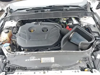 2016 Ford Fusion Titanium with VIN 3FA6P0K98GR369433, listed as a IAAI auction lot 42214785 with 64,918 mi miles and . Bid and sale history available at DreamBid. Image 10.