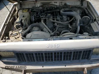 1996 Jeep Cherokee Sport with VIN 1J4FJ68S4TL146513, listed as a Copart auction lot 71039984 with 330,765 mi miles and Clean Title. Bid and sale history available at carsss.com. Image 12.