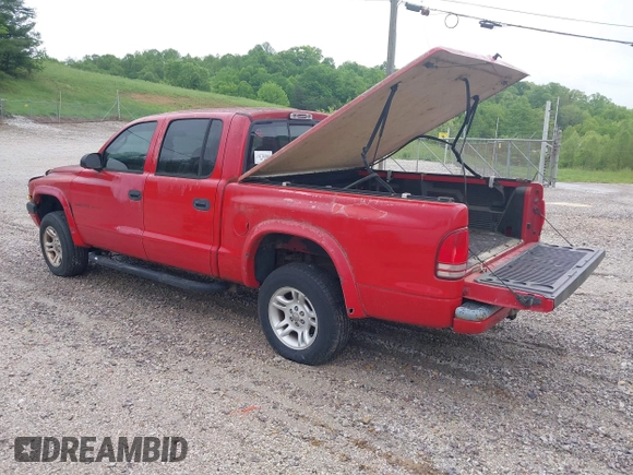 2002 Dodge Dakota Sport with VIN 1B7HG38N62S670613, listed as a IAAI auction lot 42133366 with 156,977 mi miles and . Bid and sale history available at carsss.com. Image 3.