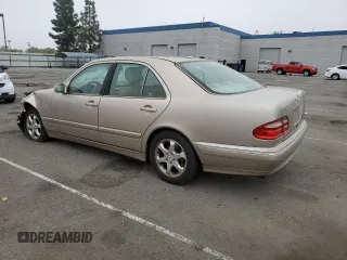 2002 Mercedes-Benz E-Class with VIN WDBJF65J92B404315, listed as a Copart auction lot 75481094 with 87,383 mi miles and Salvage Title. Bid and sale history available at carsss.com. Image 2.