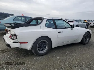 1984 Porsche 944 with VIN WP0AA0944EN453622, listed as a Copart auction lot 85871944 with 92,382 mi miles and Salvage Title. Bid and sale history available at DreamBid. Image 3.