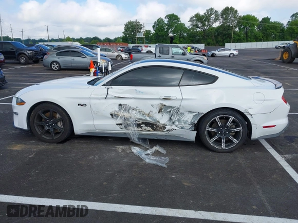 2019 Ford Mustang GT z VIN 1FA6P8CF6K5173649, wystawiony jako IAAI lot #42172829 z przebiegiem 85 346 mil mil oraz . Historia ofert i sprzedaży dostępna na DreamBid. Obrazek 14.