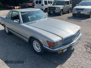 1984 Mercedes-Benz SL with VIN WDB1070421A009542, listed as a Copart auction lot 65327125 with 142,656 mi miles and Clean title. Bid and sale history available at DreamBid. Image 1.