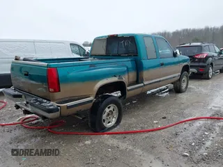 1994 GMC Sierra 1500 with VIN 2GDEK19K2R1549660, listed as a IAAI auction lot 41615642 with 207,399 mi miles and . Bid and sale history available at DreamBid. Image 4.