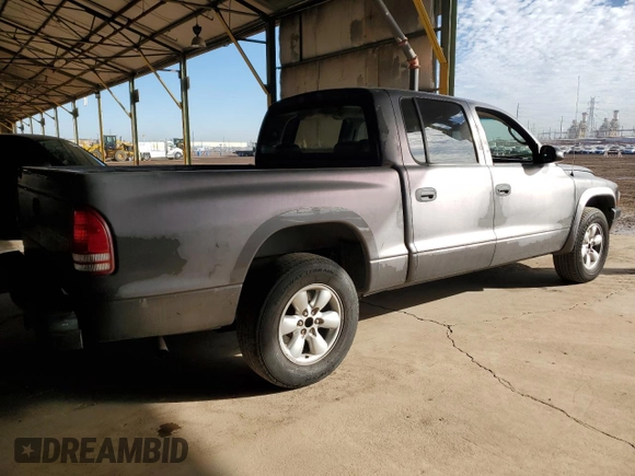 2003 Dodge Dakota Sport with VIN 1D7HL38N03S234052, listed as a Copart auction lot 44762635 with 203,591 mi miles and Salvage Title. Bid and sale history available at carsss.com. Image 3.