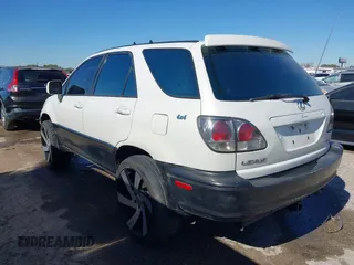 1999 Lexus RX 300 Luxury SUV with VIN JT6HF10U1X0086852, listed as a IAAI auction lot 41383711 with 284,047 mi miles. Bid and sale history available at carsss.com. Image 3.