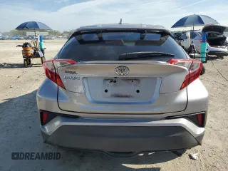 2018 Toyota C-HR XLE z VIN NMTKHMBX7JR052600, wystawiony jako Copart lot #58599785 z przebiegiem 71 144 mil mil oraz Szkoda całkowita • Salvage title. Historia ofert i sprzedaży dostępna na DreamBid. Obrazek 6.