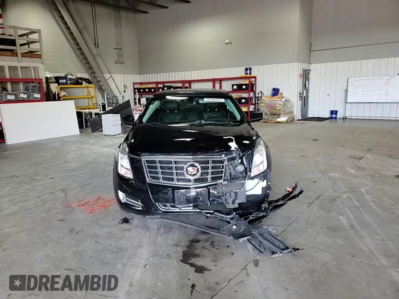 2014 Cadillac XTS Luxury z VIN 2G61N5S35E9133430, wystawiony jako Copart lot #54746235 z przebiegiem 157 544 mil mil oraz Szkoda całkowita • Salvage title. Historia ofert i sprzedaży dostępna na DreamBid. Obrazek 13.