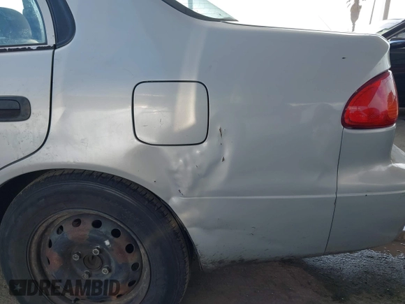 2000 Toyota Corolla VE with VIN 1NXBR12E6YZ393077, listed as a IAAI auction lot 42111914 with 181,056 mi miles and . Bid and sale history available at DreamBid. Image 21.