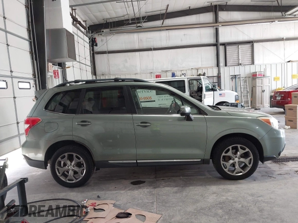 2015 Subaru Forester Touring with VIN JF2SJAUC5FH518262, listed as a IAAI auction lot 42789542 with 182,869 mi miles and . Bid and sale history available at DreamBid. Image 13.