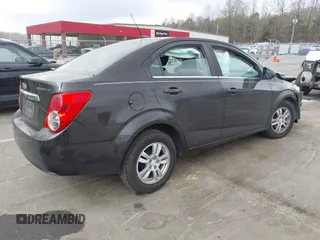 2013 Chevrolet Sonic LT with VIN 1G1JC5SH9D4193932, listed as a IAAI auction lot 41923606 with 132,339 mi miles and . Bid and sale history available at DreamBid. Image 4.