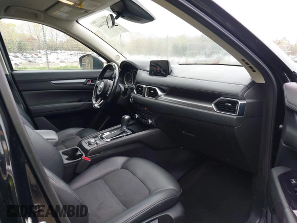 2020 Mazda CX-5 Touring with VIN JM3KFACM9L0770933, listed as a IAAI auction lot 41921464 with 75,997 mi miles. Bid and sale history available at carsss.com. Image 5.