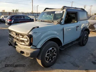 2021 Ford Bronco with VIN 1FMDE5AP0MLA98152, listed as a Copart auction lot 84872094 with 10,907 mi miles and Salvage Title. Bid and sale history available at DreamBid. Image 1.