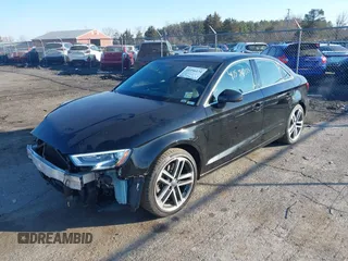 2019 Audi A3 Sedan Premium with VIN WAUBEGFFXK1019177, listed as a IAAI auction lot 41556134 with 98,741 mi miles. Bid and sale history available at carsss.com. Image 2.