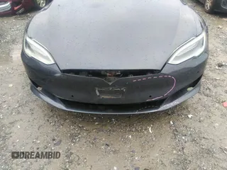 2016 Tesla Model S 70 with VIN 5YJSA1E13GF174542, listed as a IAAI auction lot 41169279 with 72,691 mi miles and . Bid and sale history available at DreamBid. Image 6.