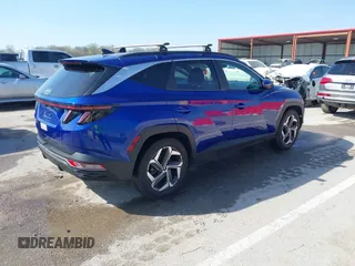 2022 Hyundai Tucson SEL with VIN 5NMJC3AE6NH127253, listed as a IAAI auction lot 41854480 with 38,956 mi miles and . Bid and sale history available at DreamBid. Image 4.