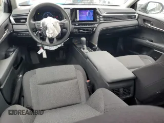 2025 Toyota Camry LE z VIN 4T1DAACK0SU073104, wystawiony jako Copart lot #51095855 z przebiegiem 10 976 mil mil oraz Szkoda całkowita • Salvage title. Historia ofert i sprzedaży dostępna na DreamBid. Obrazek 8.