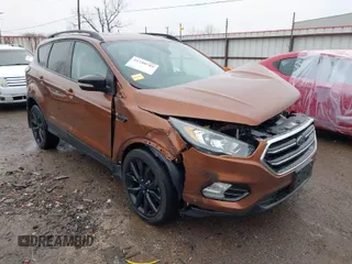 2017 Ford Escape Titanium with VIN 1FMCU9J99HUB75687, listed as a IAAI auction lot 41180789 with 108,967 mi miles. Bid and sale history available at carsss.com. Image 1.