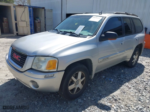2005 GMC Envoy SLE with VIN 1GKDS13S652390259, listed as a IAAI auction lot 41825258 with 162,172 mi miles. Bid and sale history available at carsss.com. Image 2.