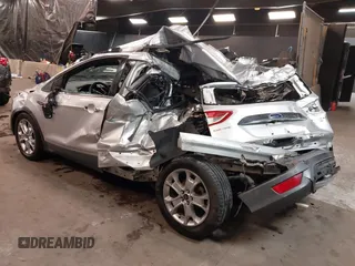 2016 Ford Escape Titanium with VIN 1FMCU9J94GUB00815, listed as a IAAI auction lot 40893687 with 152,891 mi miles. Bid and sale history available at carsss.com. Image 3.